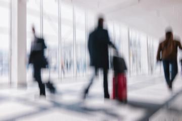 Intentionally blurred commuters in a airport background- Stock Photo or Stock Video of rcfotostock | RC Photo Stock