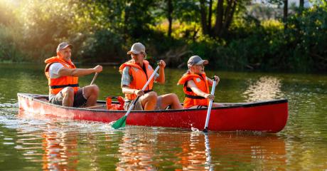 joyful family canoeing on a calm river at summer mother and daughter paddling at front, father at the back in germany. Family on kayak ride. Wild nature and water fun on summer vacation.- Stock Photo or Stock Video of rcfotostock | RC Photo Stock