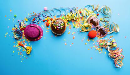 Krapfen, berliner or Carnival donut from Germany with icing sugar on a blue background, copy space with confetti and streamers on it - background for a carnival party or parties- Stock Photo or Stock Video of rcfotostock | RC Photo Stock