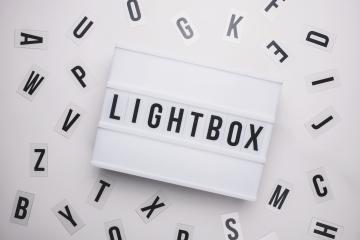 Lightbox on a table with typography letters- Stock Photo or Stock Video of rcfotostock | RC-Photo-Stock