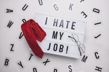 Lightbox with words I Hate My Job and office glasses with red tie, business concept image- Stock Photo or Stock Video of rcfotostock | RC-Photo-Stock