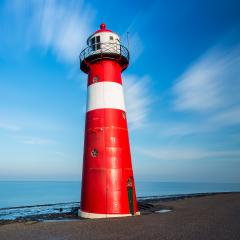 lighthouse at the sea with cloudy sky : Stock Photo or Stock Video Download rcfotostock photos, images and assets rcfotostock | RC Photo Stock.: