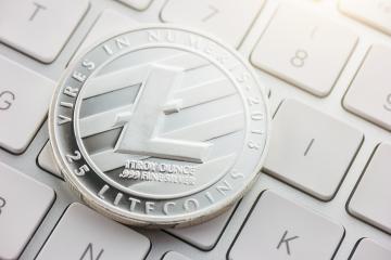 Litecoin cryptocurrency, digital money on a keyboard- Stock Photo or Stock Video of rcfotostock | RC Photo Stock