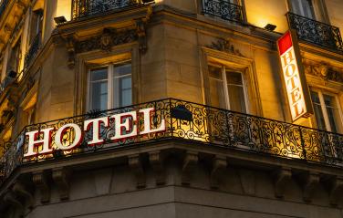 lluminated hotel sign taken in Paris at night- Stock Photo or Stock Video of rcfotostock | RC Photo Stock
