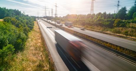 Lots of Trucks and cars on a Highway - transportation concept- Stock Photo or Stock Video of rcfotostock | RC-Photo-Stock