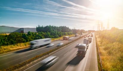 Lots of Trucks and cars on a Highway - transportation concept- Stock Photo or Stock Video of rcfotostock | RC-Photo-Stock