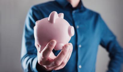 Male hand holding a piggy bank- Stock Photo or Stock Video of rcfotostock | RC-Photo-Stock