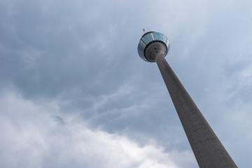 Mammatus clouds at the tv tower (Rheinturm) of Dusseldorf in Germany- Stock Photo or Stock Video of rcfotostock | RC Photo Stock