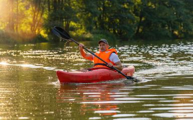 man driving with kayak on forest river- Stock Photo or Stock Video of rcfotostock | RC Photo Stock