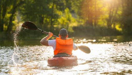 man is kayaking on the river at a summer day- Stock Photo or Stock Video of rcfotostock | RC Photo Stock