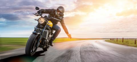 man on a motorbike on the road riding. having fun driving the empty road on a motorcycle tour journey. copyspace for your individual text. : Stock Photo or Stock Video Download rcfotostock photos, images and assets rcfotostock | RC-Photo-Stock.:
