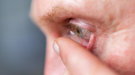 man putting contact lens in his right eye, close up : Stock Photo or Stock Video Download rcfotostock photos, images and assets rcfotostock | RC Photo Stock.: