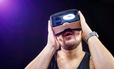 Man uses Virtual Realitiy VR head-mounted display- Stock Photo or Stock Video of rcfotostock | RC-Photo-Stock