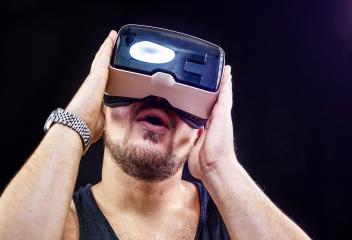 Man uses Virtual Realitiy VR head-mounted display- Stock Photo or Stock Video of rcfotostock | RC Photo Stock
