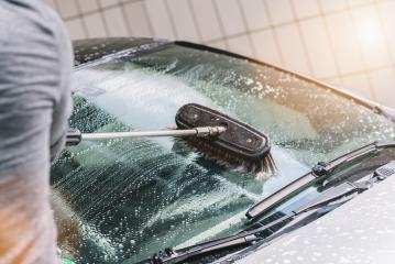 man washing his car with brush outdoors- Stock Photo or Stock Video of rcfotostock | RC Photo Stock