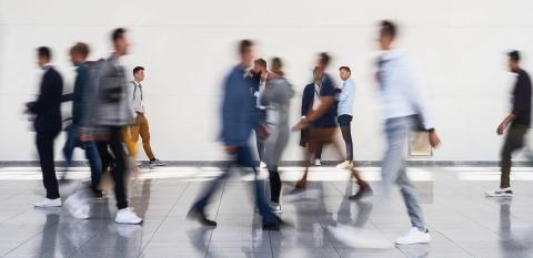 Many anonymous people walk to business trade fair : Stock Photo or Stock Video Download rcfotostock photos, images and assets rcfotostock | RC Photo Stock.: