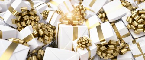 Many gold and white gifts for Christmas on a big pile- Stock Photo or Stock Video of rcfotostock | RC Photo Stock