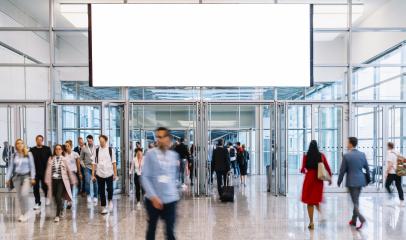 Many people under blank billboard at a trade fair- Stock Photo or Stock Video of rcfotostock | RC Photo Stock