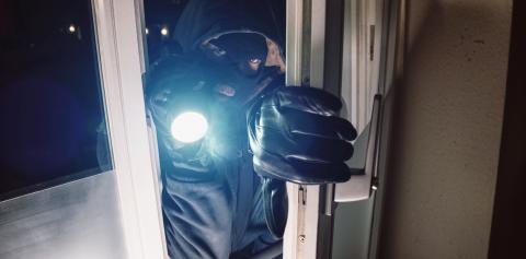 Masked burglar entering amd breaking into a house window with  flashlight  : Stock Photo or Stock Video Download rcfotostock photos, images and assets rcfotostock | RC-Photo-Stock.: