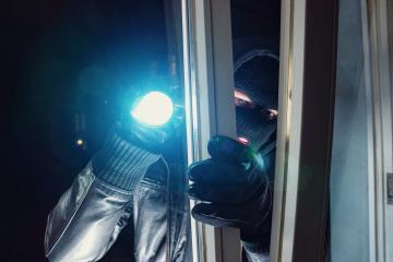 Masked Burglar shines with flashlight in to a Victim´s home at night- Stock Photo or Stock Video of rcfotostock | RC Photo Stock
