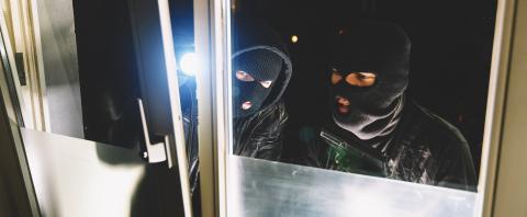 Masked man as a burglar or thief with flashlight and balaclava- Stock Photo or Stock Video of rcfotostock | RC-Photo-Stock