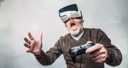 Mature man wearing virtual reality goggles / VR Glasses to play video games- Stock Photo or Stock Video of rcfotostock | RC Photo Stock
