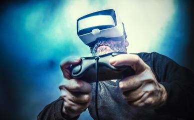 Mature man wearing virtual reality goggles / VR Glasses to play video games- Stock Photo or Stock Video of rcfotostock | RC Photo Stock