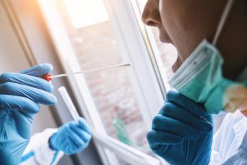 Medical in protective clothing takes COVID-19 swab test tube from mouth at Covid-19 test center during coronavirus epidemic. PCR DNA testing protocol process.- Stock Photo or Stock Video of rcfotostock | RC Photo Stock