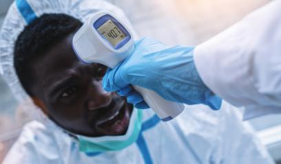 Medical professionals in protective clothing measuring contactless fever at Covid-19 test center during coronavirus epidemic- Stock Photo or Stock Video of rcfotostock | RC-Photo-Stock