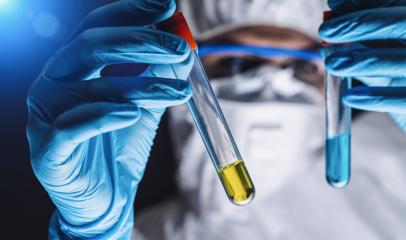 medical scientist holds test tubes with Coronavirus 2019-nCoV vaccination in the development at the lab. Virus concept. Coronavirus outbreaking concept image : Stock Photo or Stock Video Download rcfotostock photos, images and assets rcfotostock | RC-Photo-Stock.: