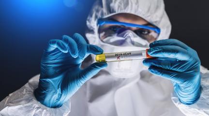 Medical worker with blood sample in the laboratory positive for Covid-19 or Coronavirus test- Stock Photo or Stock Video of rcfotostock | RC Photo Stock