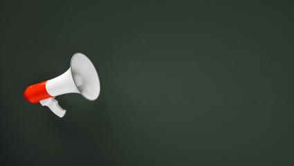 megaphone in front of a  blackboard background - 3D Rendering - Stock Photo or Stock Video of rcfotostock | RC Photo Stock