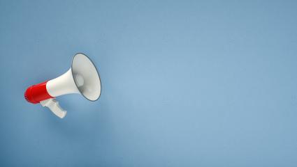 megaphone in front of a blue background - 3D Rendering - Stock Photo or Stock Video of rcfotostock | RC Photo Stock