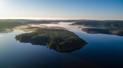 Misty lake surrounded by forest at sunrise
- Stock Photo or Stock Video of rcfotostock | RC Photo Stock