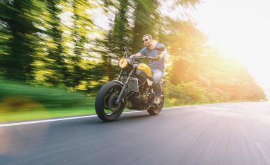 modern scrambler motorbike on the road riding a motorcycle at sunset. copyspace for your individual text.- Stock Photo or Stock Video of rcfotostock | RC-Photo-Stock