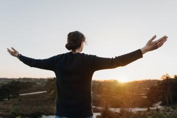 Motivated, cheerful person with outstretched, open arms in beautiful, relaxing nature. Woman feels freedom, motivation and has goals in life.- Stock Photo or Stock Video of rcfotostock | RC Photo Stock