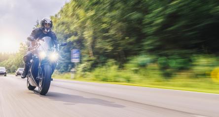 motorbike on the road driving fast. having fun on the empty highway on a motorcycle journey.  : Stock Photo or Stock Video Download rcfotostock photos, images and assets rcfotostock | RC-Photo-Stock.: