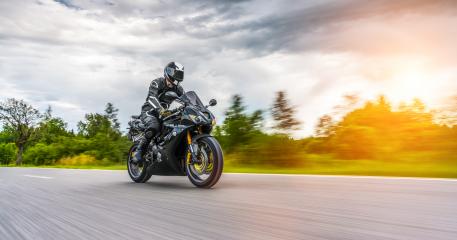 motorbike on the road riding. having fun riding the empty road on a motorcycle tour / journey : Stock Photo or Stock Video Download rcfotostock photos, images and assets rcfotostock | RC Photo Stock.: