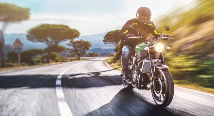 motorbike on the road riding. having fun riding the empty road on a motorcycle tour / journey : Stock Photo or Stock Video Download rcfotostock photos, images and assets rcfotostock | RC-Photo-Stock.:
