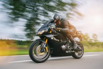motorbike on the road riding with motion speed. driving on the empty road on a motorcycle tour. copyspace for your individual text. : Stock Photo or Stock Video Download rcfotostock photos, images and assets rcfotostock | RC-Photo-Stock.: