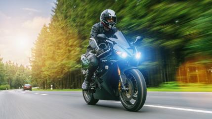 motorbiker on the forest road riding. having fun driving the empty road on a motorcycle tour journey : Stock Photo or Stock Video Download rcfotostock photos, images and assets rcfotostock | RC-Photo-Stock.: