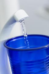 Mouthwash cup in fill with water at dental clinic- Stock Photo or Stock Video of rcfotostock | RC-Photo-Stock