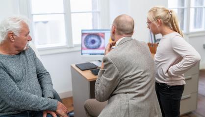 Optometrist reviewing a senior patient's eye scan on a computer,- Stock Photo or Stock Video of rcfotostock | RC Photo Stock