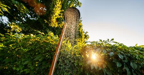 Outdoor shower at sunset for showering body before jumping in the resort pool. Golden Hour Refreshment Spa wellness concept image- Stock Photo or Stock Video of rcfotostock | RC Photo Stock