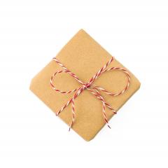 packaging christmas gift in a box on white background- Stock Photo or Stock Video of rcfotostock | RC Photo Stock