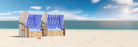Panorama with beach chair couple on sand beach under blue sky, copy space for individual text- Stock Photo or Stock Video of rcfotostock | RC-Photo-Stock