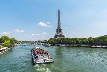 Paris Eiffel Tower and river Seine in Paris, France. Eiffel Tower is one of the most iconic landmarks of Paris.- Stock Photo or Stock Video of rcfotostock | RC Photo Stock