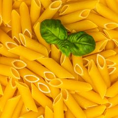 penne integral pasta with basil leaf- Stock Photo or Stock Video of rcfotostock | RC Photo Stock