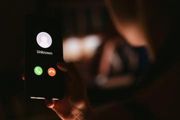 Phone call from unknown number late at night. Scam, fraud or phishing with smartphone concept. Prank caller, scammer or stranger. Woman answering to incoming call. Hoax person with fake identity.- Stock Photo or Stock Video of rcfotostock | RC Photo Stock