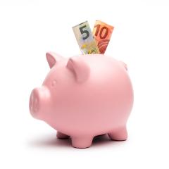 Piggy Bank with a 5 and 10 euro note on white- Stock Photo or Stock Video of rcfotostock | RC Photo Stock